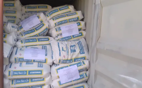 Plaster bags loaded into a container bound for Douala