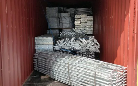 Galvanised scaffolding components loaded into a container for Libreville